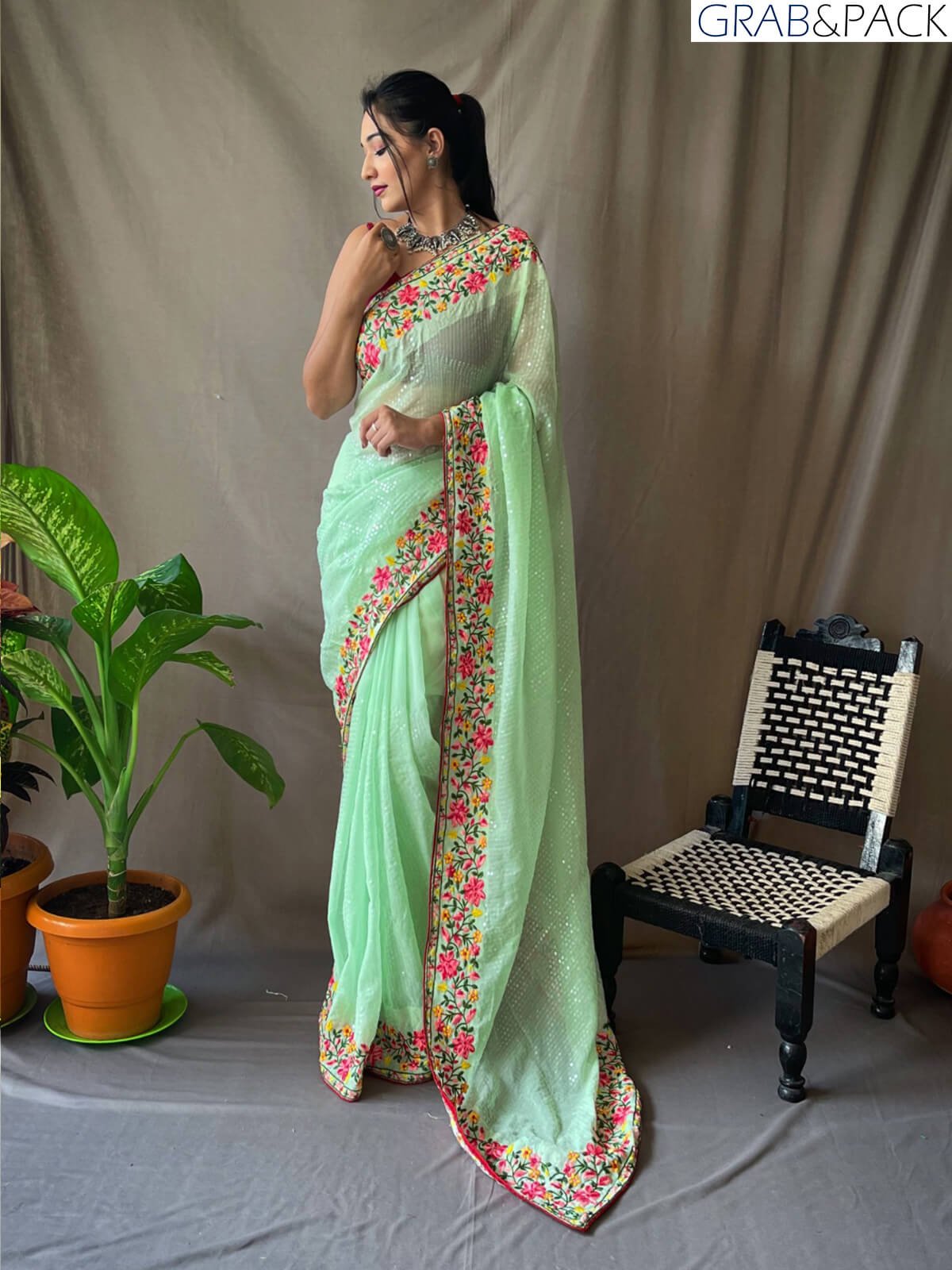 Green sequin Georgette Saree GNP230001